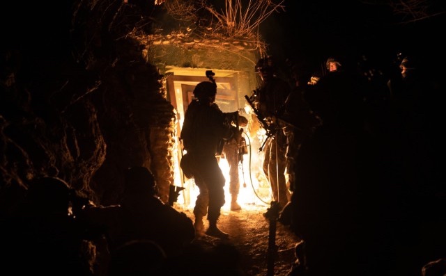 American soldiers practice tunnel fighting